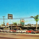 Illustration for article titled Heres Proof Large Car Dealerships Used To Be A Little Bit Weirder